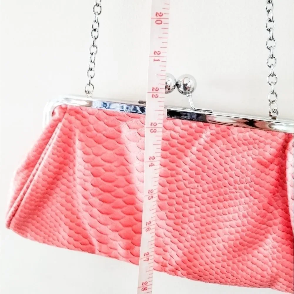Expressions NYC clutch with metal shoulder bag